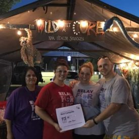 RHA Trenton Tennessee Unit Relay for Life team members pose with their Best Campsite award (left to right: Luz Poole, Lacey Elliot, Georgia Rutherford, and Dustin Lowrance)