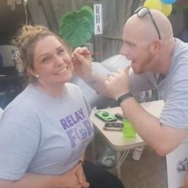 Dustin Lowrance and Georgia Rutherford of the RHA Trenton Tennessee Unit get into the Relay for Life Spirit with Face Painting