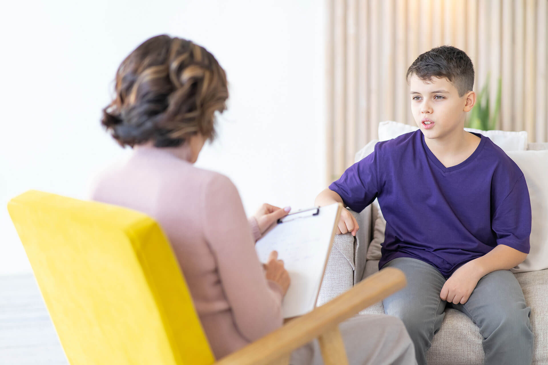 A therapist provides outpatient services to a boy with intellectual disabilities