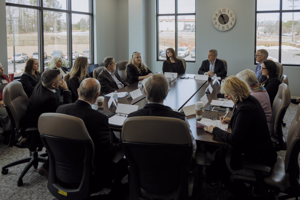 Local and state mental health advocates participate in a roundtable discussion at RHA's Alamance Behavioral Health Center